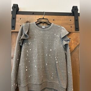 Clare V grey paint splatter ruffle sweater shirt. On The Real Real for $148